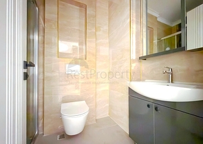 Простора квартира з сучасним дизайном в Махмутларі