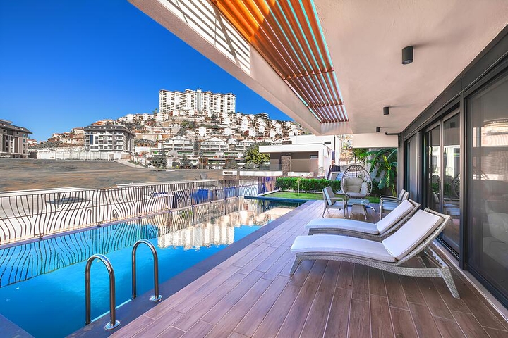 Сучасна вілла 3+1 з терасою і розвиненою інфраструктурою в районі Каргиджак