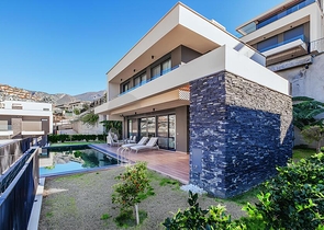 Сучасна вілла 3+1 з терасою і розвиненою інфраструктурою в районі Каргиджак